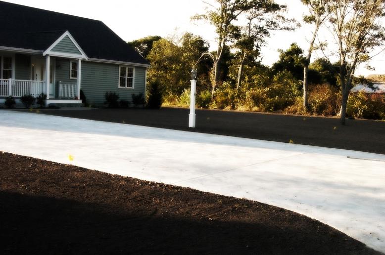 Cape Cod Landscape & Hydroseeding, Lawn Preparation, Loam Delivered and spread for new lawn